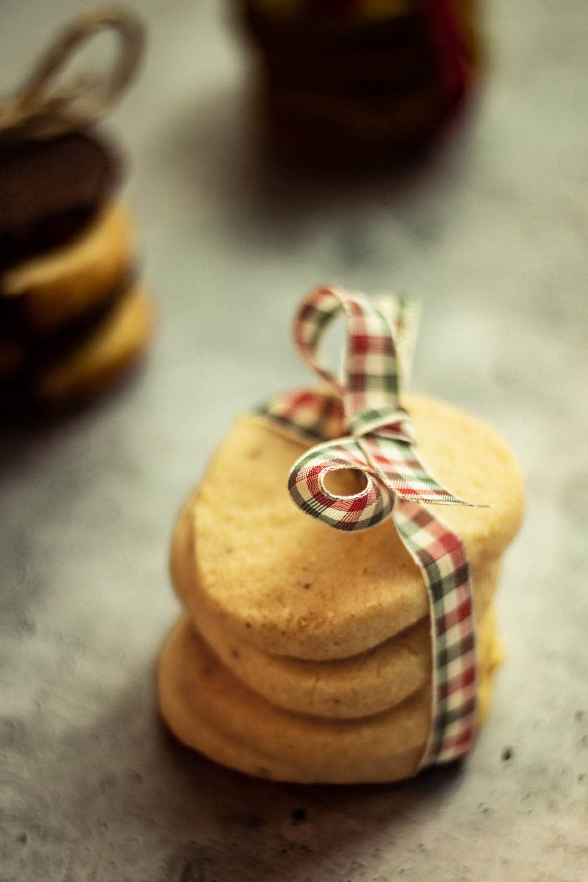 Classic German Shortbread Cookies  piled up and wrapped with a ribbon