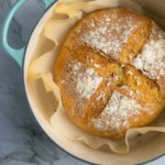 Semolina bread in a dutch oven with parch ment paper