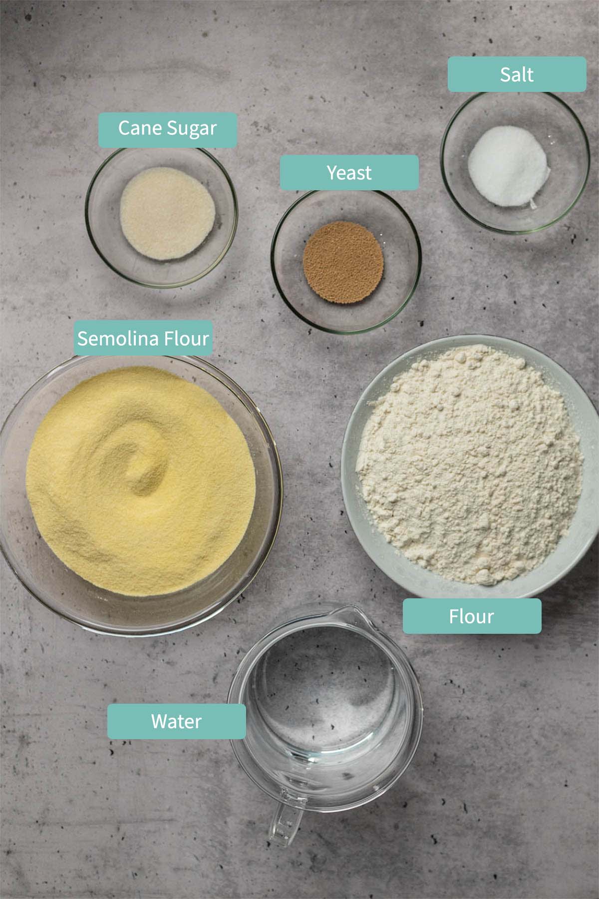 All ingredients for semolina bread as listed and described in content below.